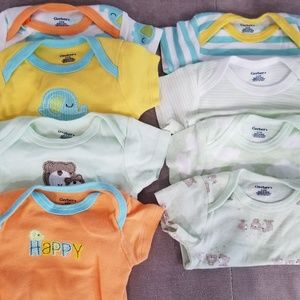 8 new and lightly used baby onsies